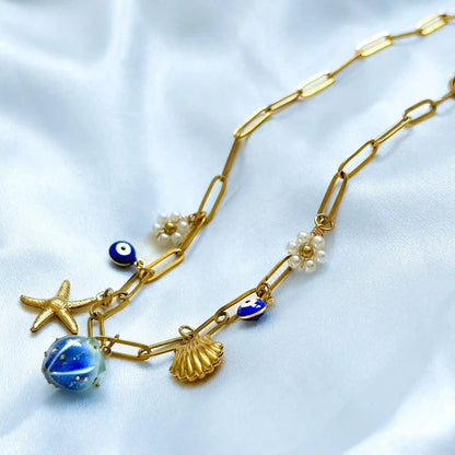 Blue charm necklace top